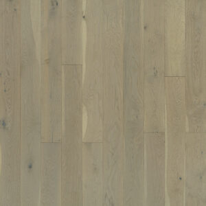 Light oak wooden floor with narrow planks and subtle grain patterns, showing natural knots and seams in the boards.